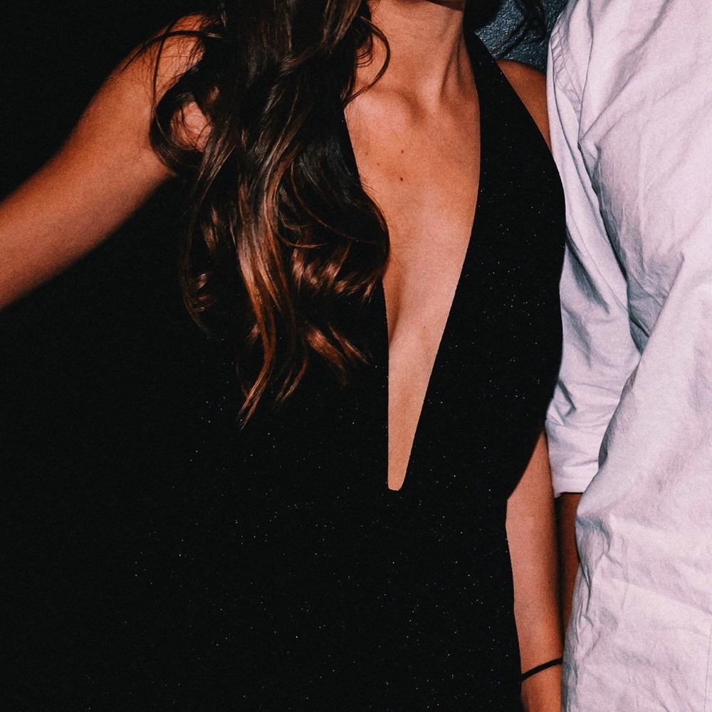 black sparkly low v halter neck romper